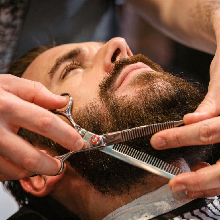 flux pro 2.0 barber working on beard using scissors and comb detailed grooming process focus 0